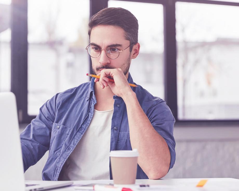 Participants reviewing investment portfolios during October workshop