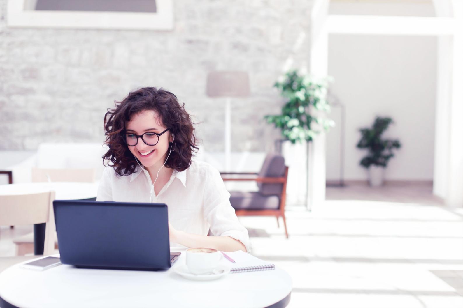 Graduate reviewing course materials and investment strategy notes